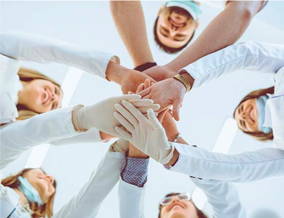 Experienced team at Radiance Dental high fiving